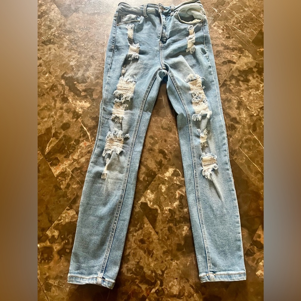 ankle ripped jeans